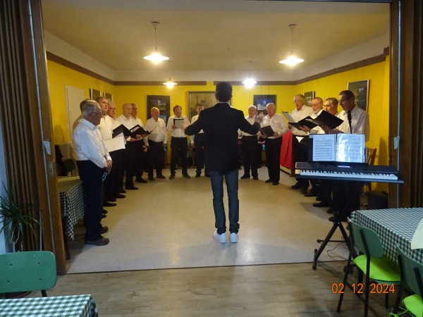 Letni koncert Moškega pevskega zbora DUJ, 2. december 2024